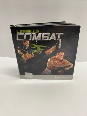^ Les Mills COMBAT Beachbody 5-DVD Base Workout Set - MMA Fitness